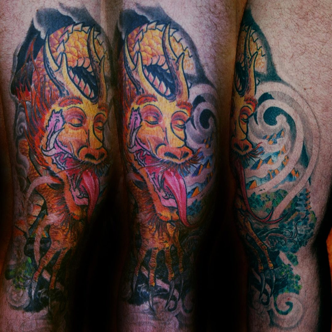 Drache am Knie Tattoo