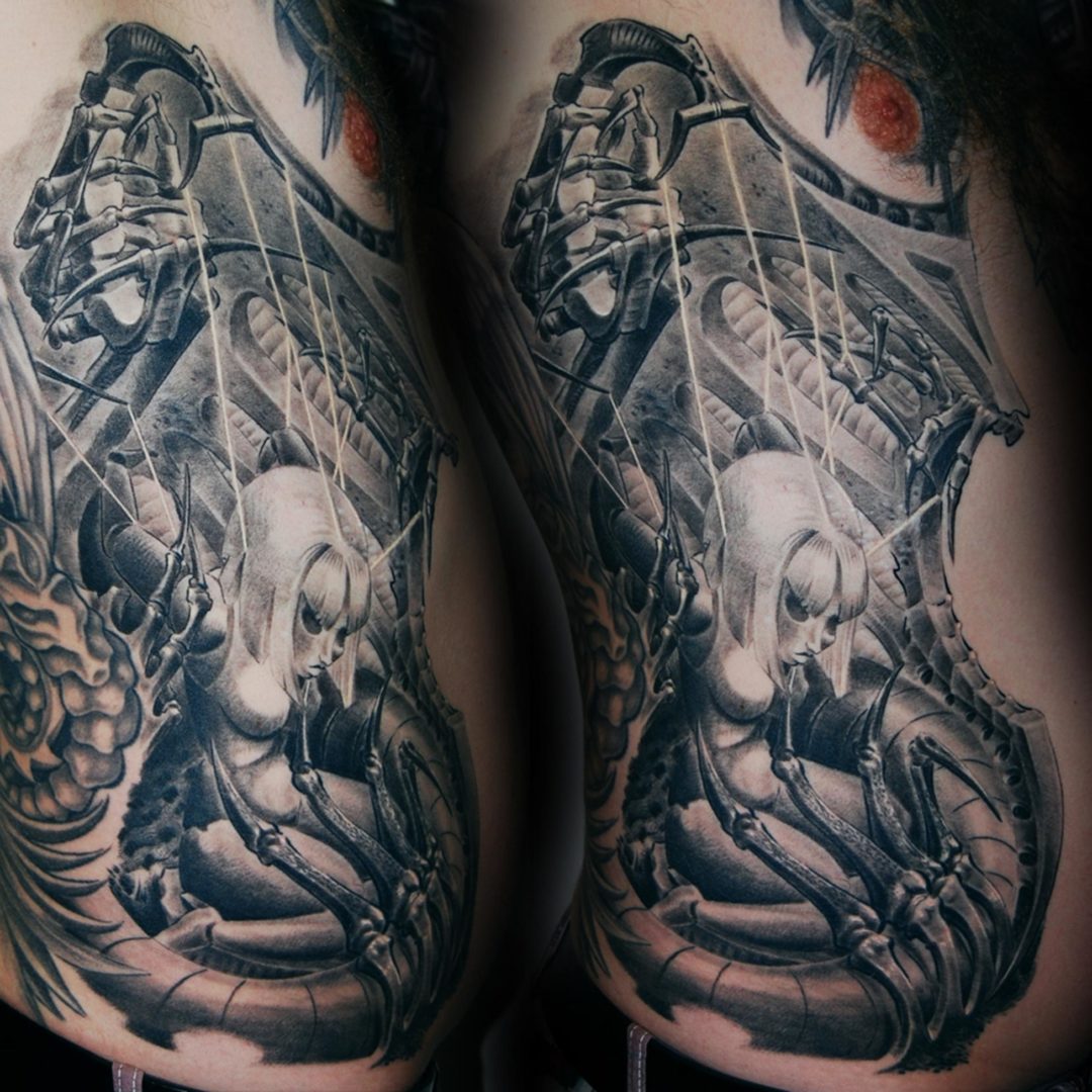 Puppe an der Strippe Biomechanik Tattoo