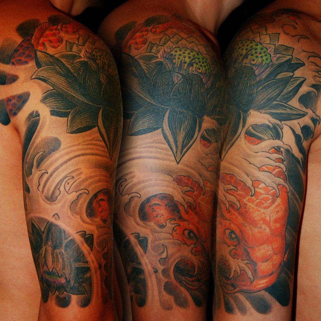 japanischer Koi Fisch Cover-up Tattoo München mit Lotus