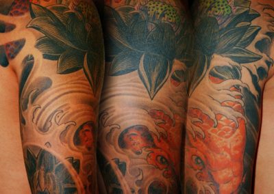 japanischer Koi Fisch Cover-up Tattoo München mit Lotus