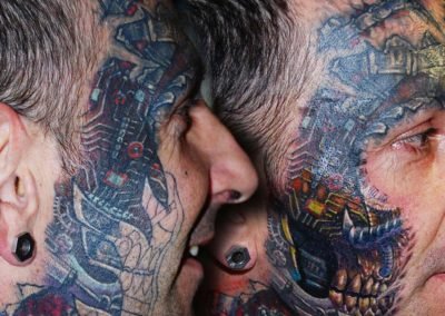 Biomechanik Gesicht Überdeckung Coverup Tattoo