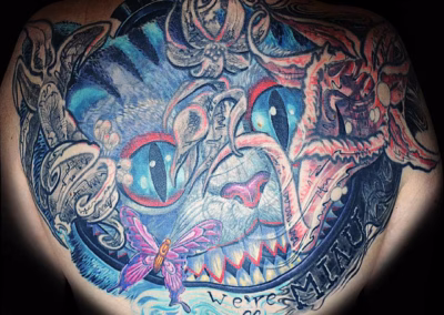 Grinsekatze Tattoo